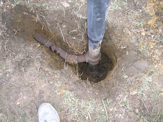 post in ground.JPG